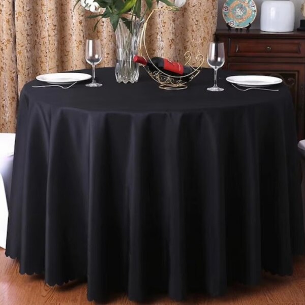 black round tablecloth with jagged edge
